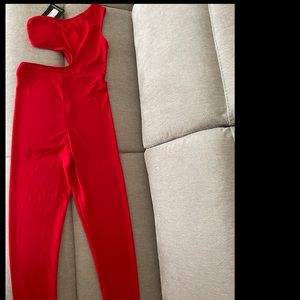 Red jumpsuit by PrettyLittleThing